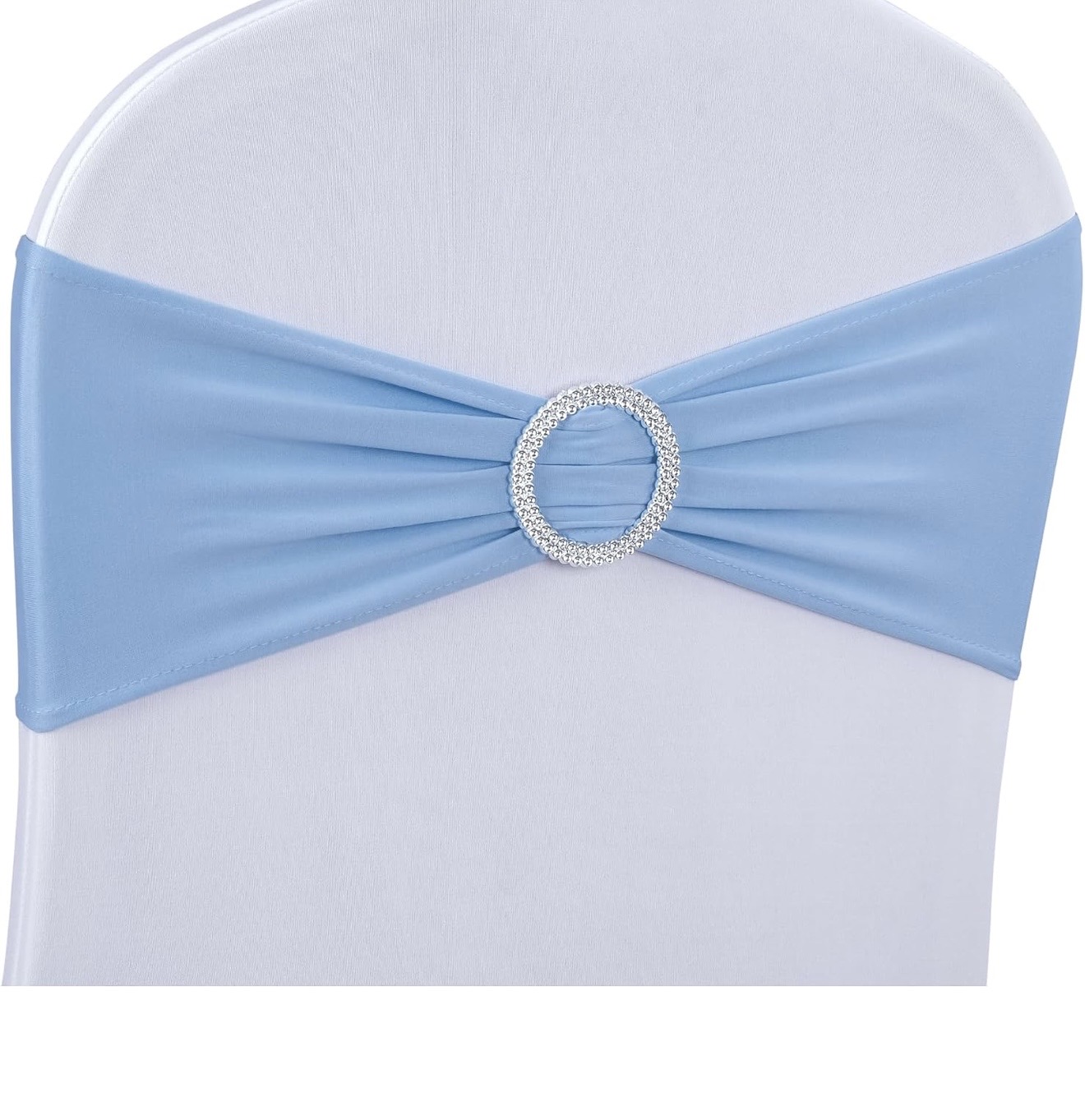 White chair with a light blue spandex sash and rhinestone buckle